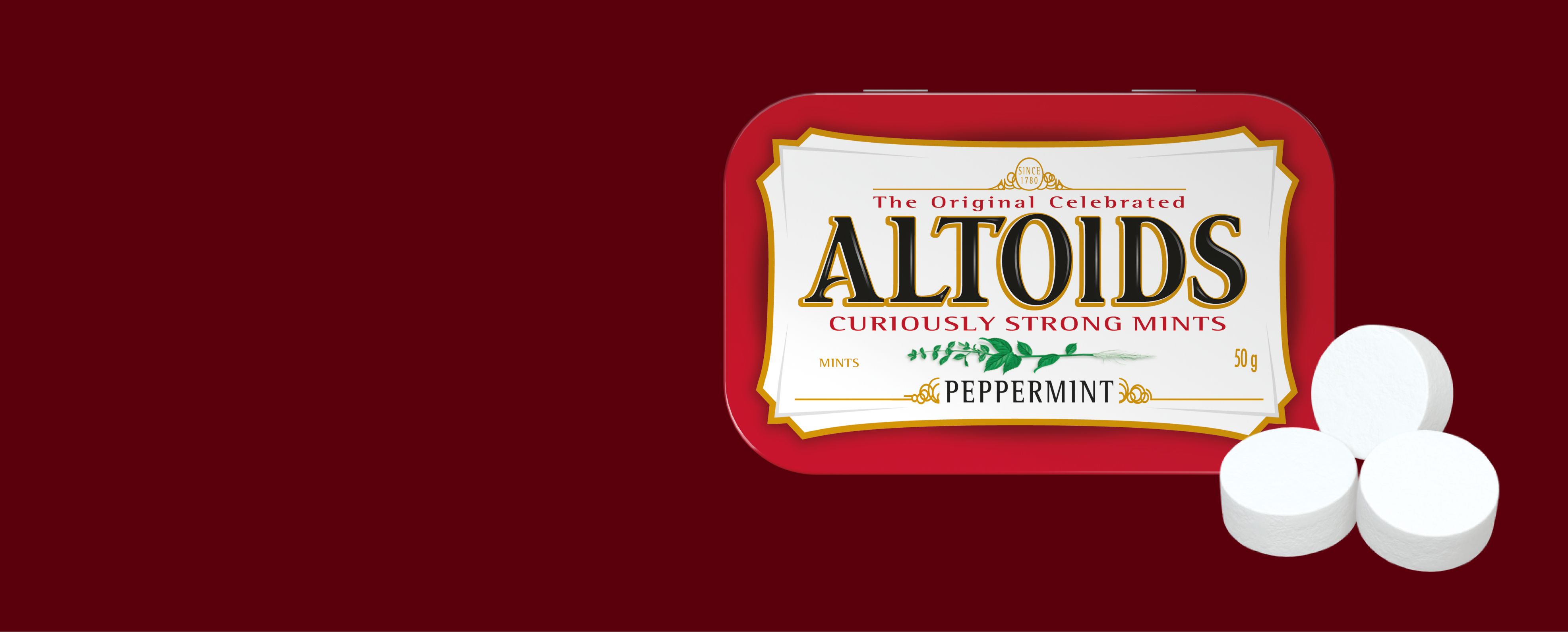 Tin of Peppermint Altoids and three Altoids mints on a dark red background