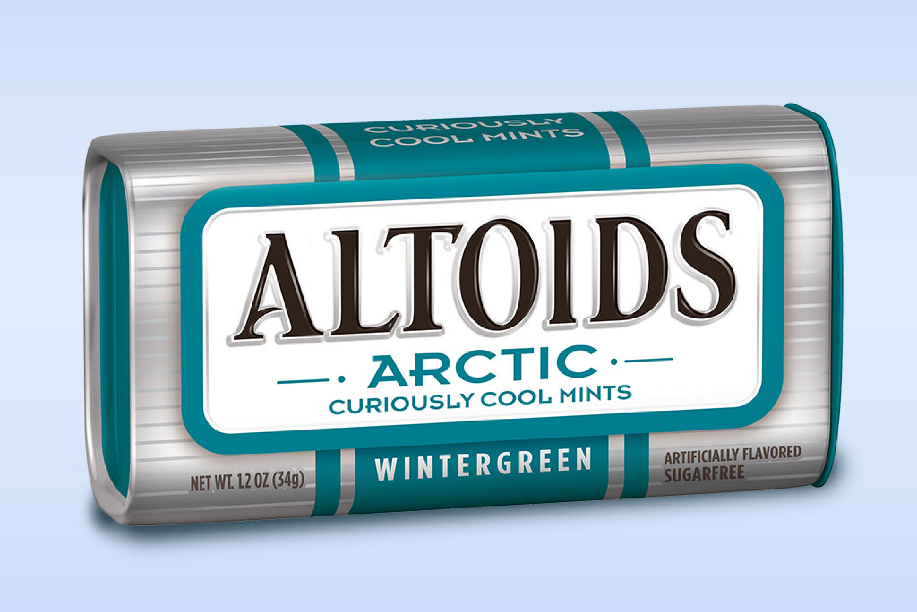 Tin of Wintergreen Arctic Altoids on a blue background