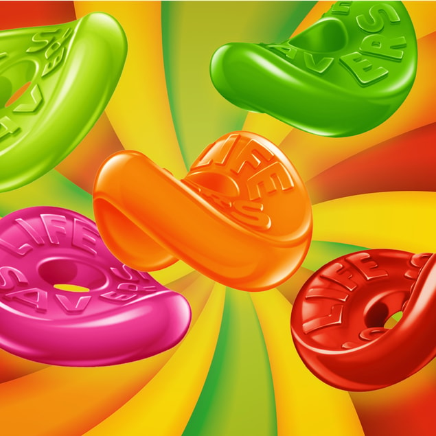 Zoomed in Life Savers gummies on top of colorful swirled background