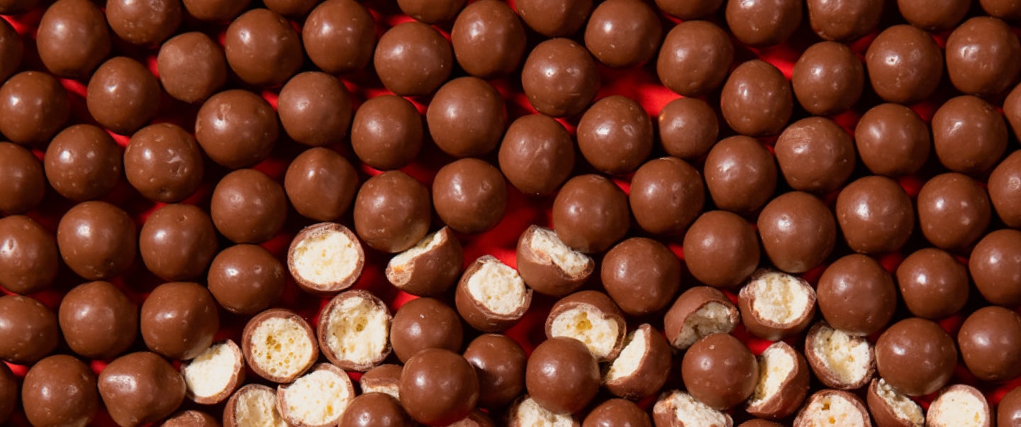 Pile of whole and half Maltesers 